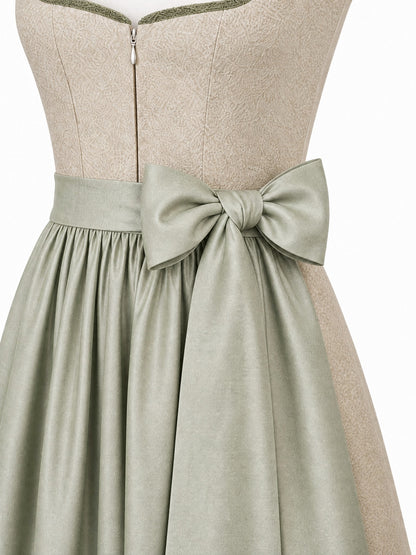 Dirndl Nora in Tonbeige mit Eukalyptusgrün Schürze - Detailansicht Taille und Schleife