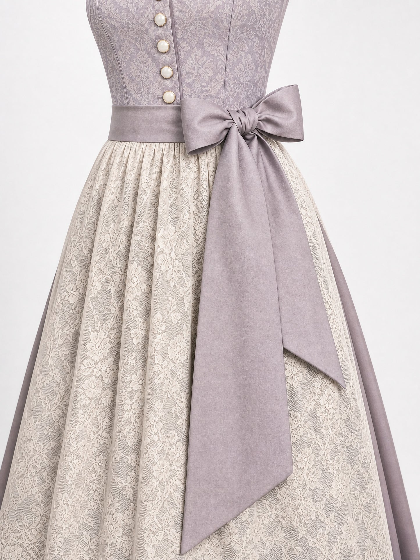 Dirndl Elisa in Alt-Lavendel mit Elfenbein Schürze - Detailansicht Taille und Schleife